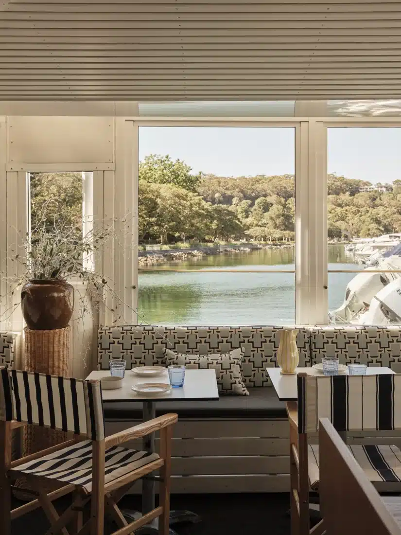 Chiosco dining tables and windows overlooking the marina