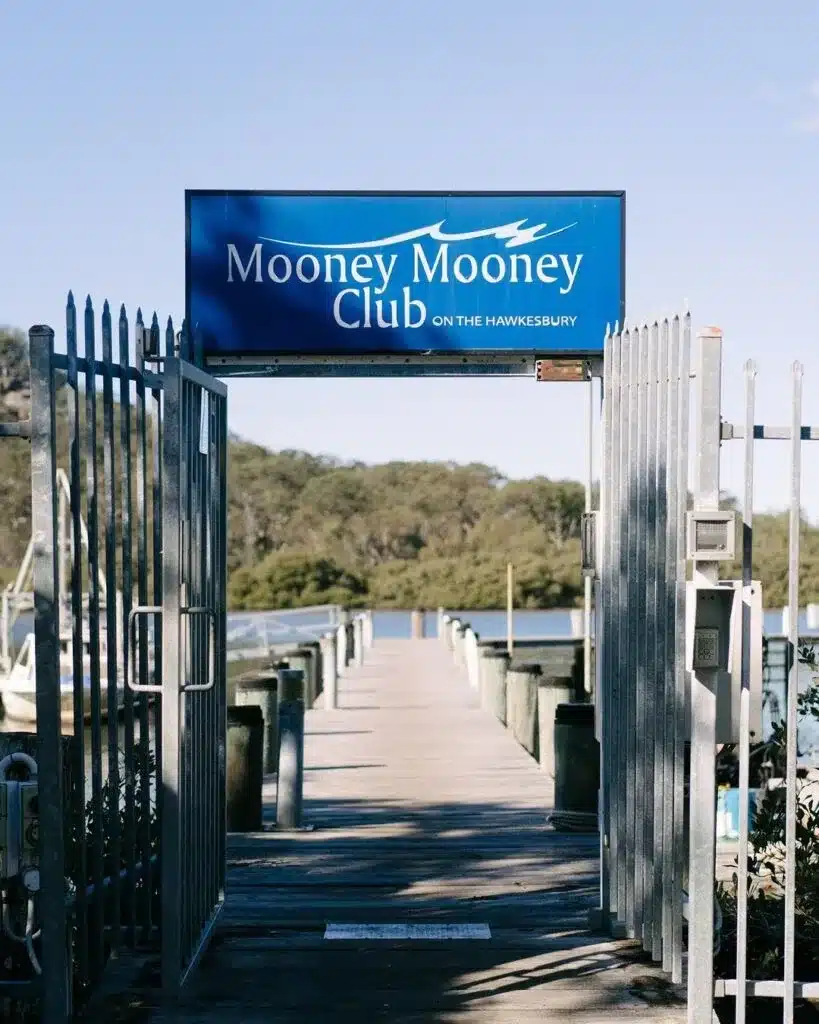 Mooney Mooney Club sign above the entrance to its jetty